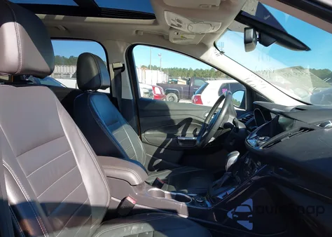 2016 Ford Escape Titanium z USA, uszkodzony, nr VIN 1FMCU9J93GUA18235